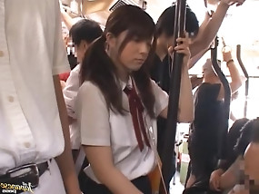 Amateur Asian gal in schoolgirl uniform gets dicked in public transportation.